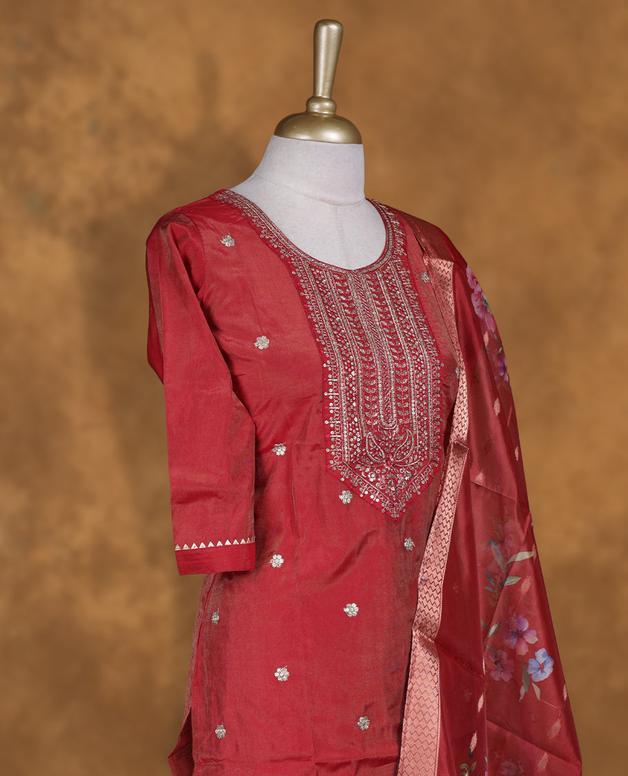 Dark Red colour churidar set featuring thread and cut beats embroidered neckline, sleeves, and Gold colour motifs on body , Paired with a matching dupatta
