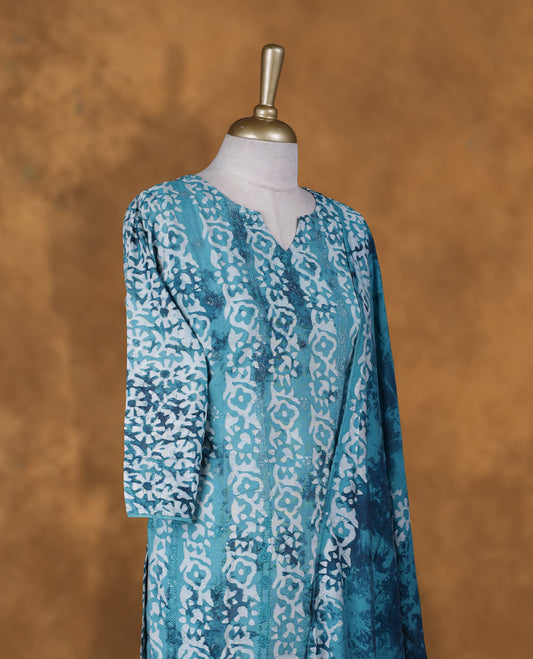 Blue and white colour churidar set featuring Round with spilt neckline, sleeves, and White floral pattern across the body, Paired with a matching dupatta