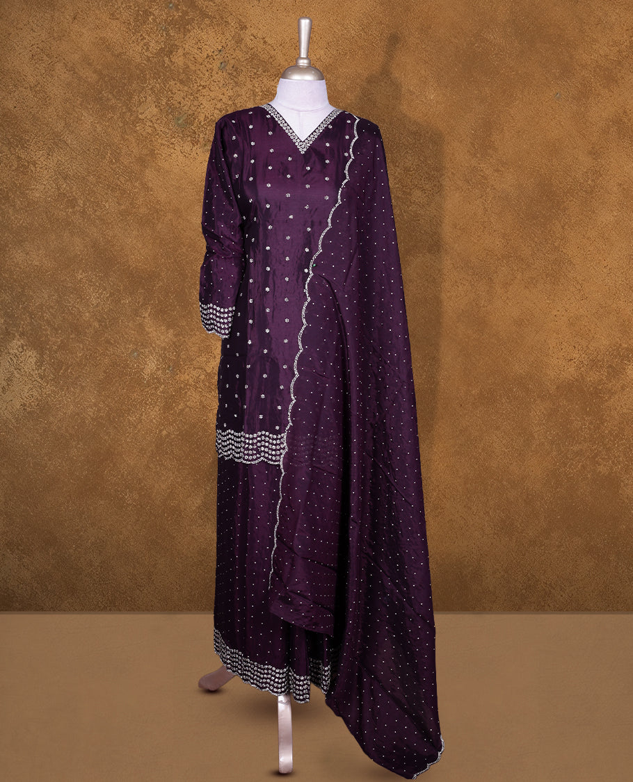 Dark purple colour sharara set featuring gold stone pattern neckline, sleeves, and stone pattern across on body , Paired with a matching dupatta