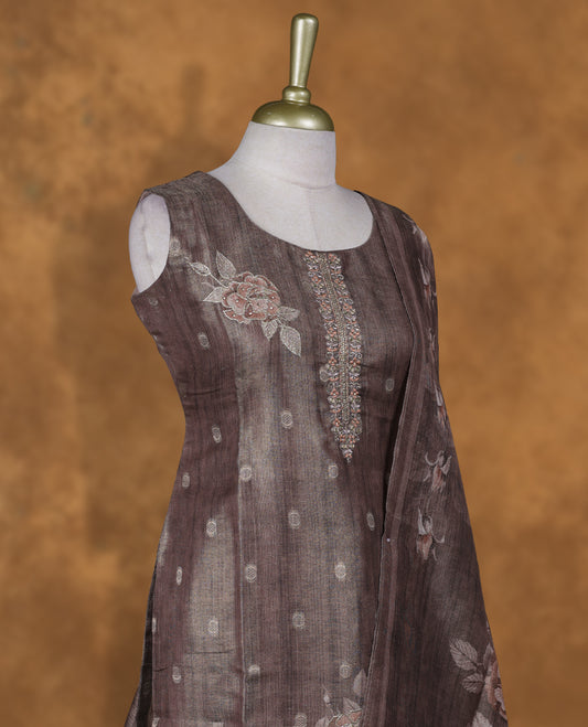 Brown colour churidar set featuring thread and cut beats embroidered neckline, sleeves, and Gold colour motifs on body , Paired with a matching dupatta