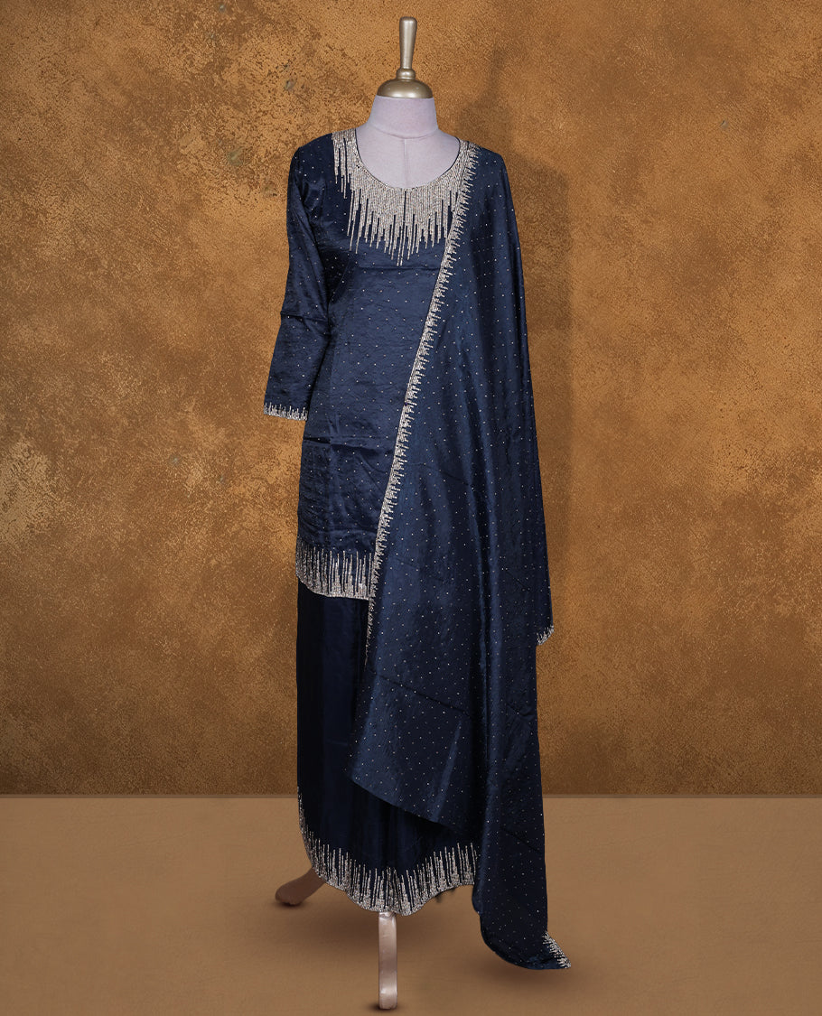 Dark imperial blue colour sharara set featuring gold colour stone worked on neckline, sleeves, and Stone scattered on body , Paired with a matching dupatta