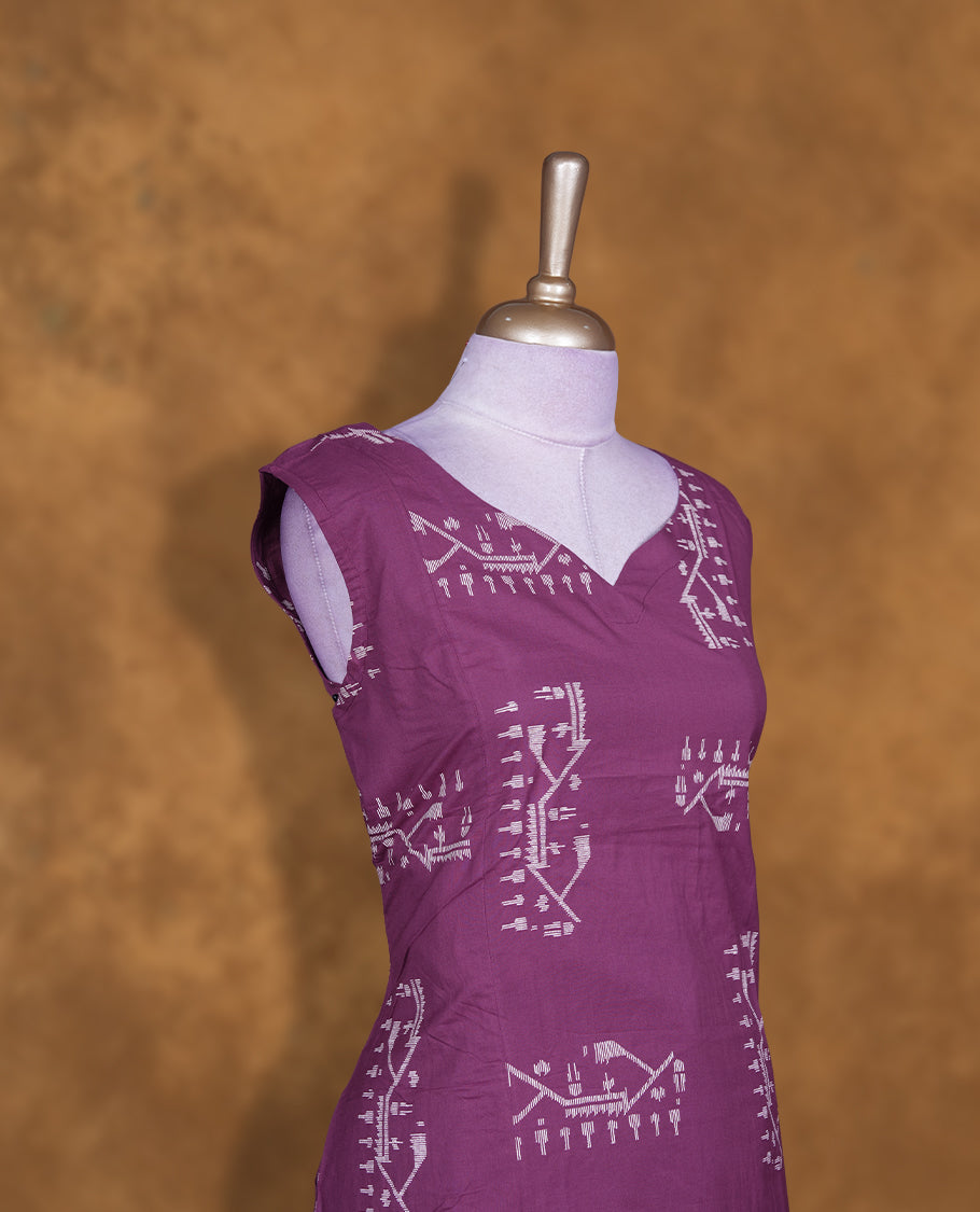 Purple colour coord set featuring cream colour pattern cross kurti and matching bottom pant.