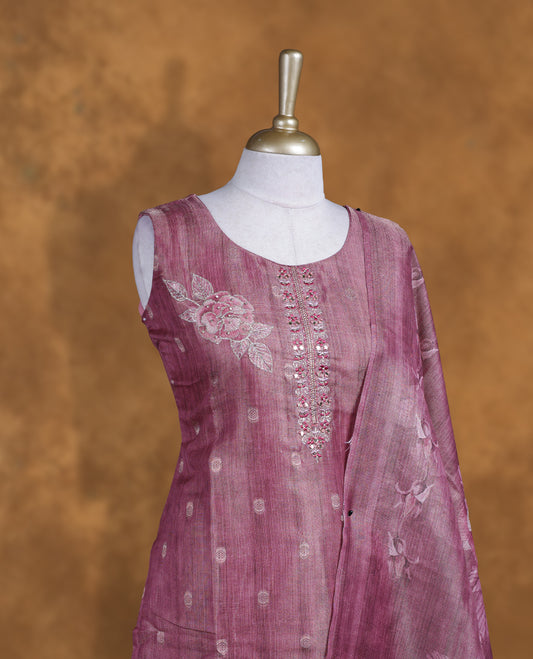 Pinkish bronze colour churidar set featuring thread and Mirror work on neckline, sleeves, and Gold colour motifs on body , Paired with a matching dupatta