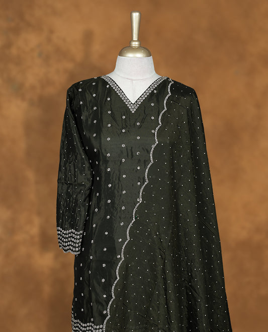 Dark green colour sharara set featuring gold stone pattern neckline, sleeves, and stone pattern across on body , Paired with a matching dupatta