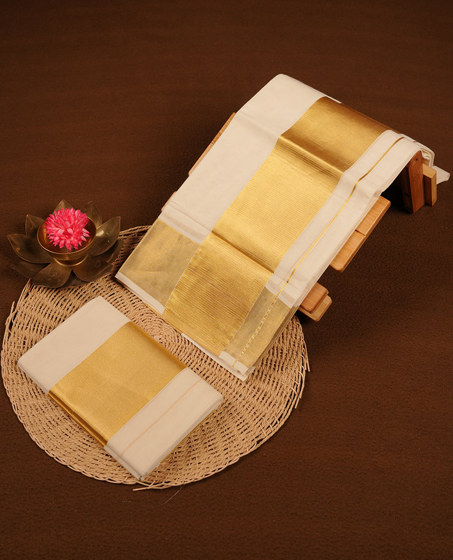Off white colour cotton set mundu highlights traditional gold zari bor