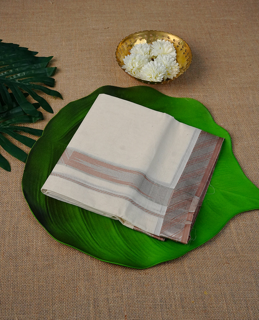 Cream Colour Cotton Double Dhoti Finished With A Classic Body ,Featuring  Nude Brown Strips On Silver Zari Kara
