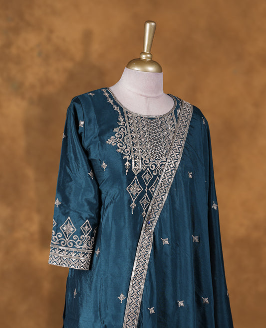 Teal colour sharara set featuring thread embroidered and stone neckline, sleeves, and thread embroidery on body , Paired with a matching dupatta