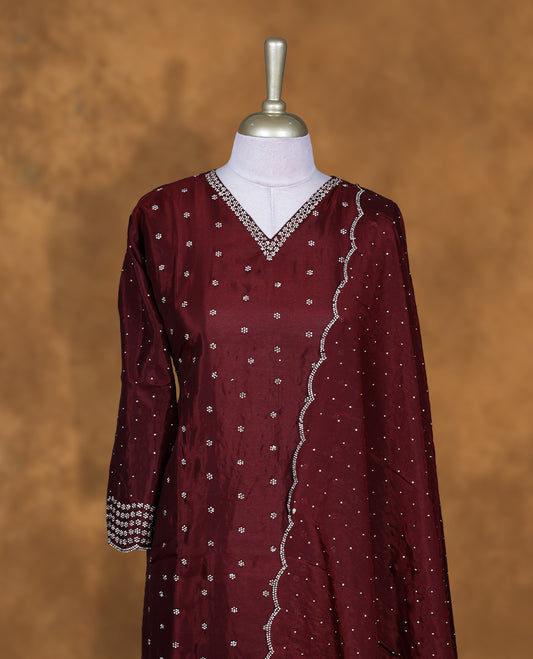 Brown colour sharara set featuring gold stone pattern neckline, sleeves, and stone pattern across on body , Paired with a matching dupatta