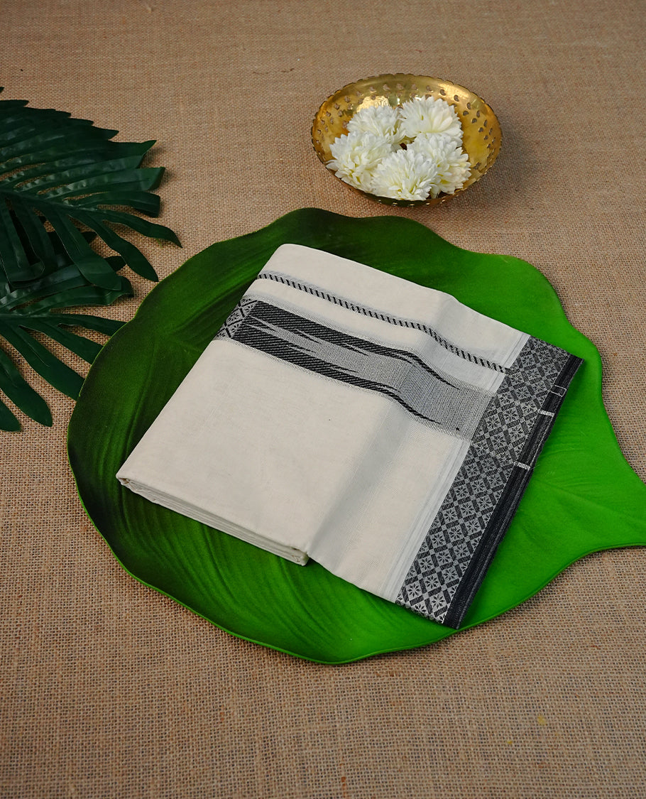 Cream colour cotton double dhoti with plain with Black & silver Zari designed border