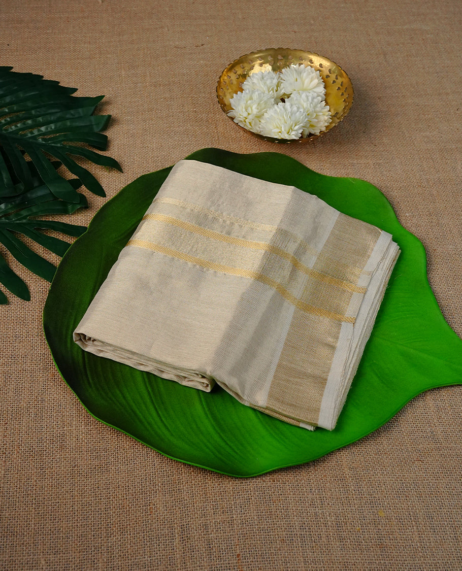 Light gold Pure Tissue Double Dhoti Featuring Classic Gold zari kara.