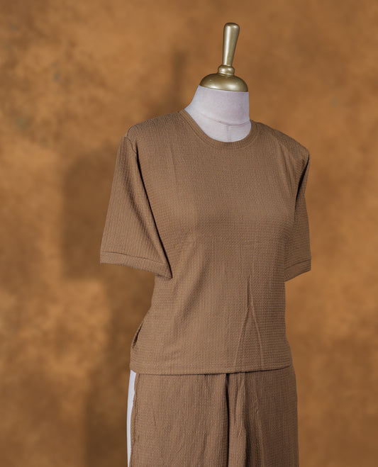 Bronze colour coord set styled with a T shirt design with short sleeve, pair a matching bottom pant .