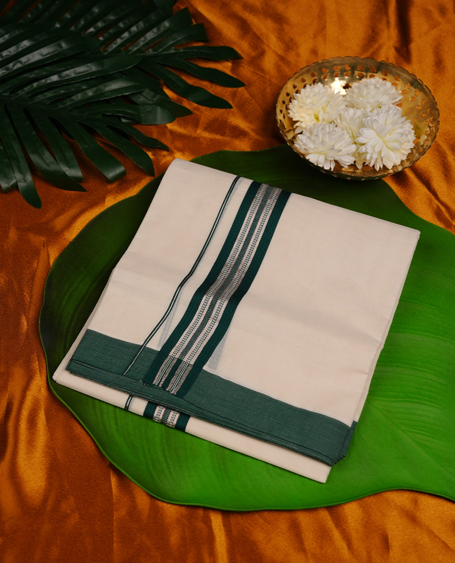 Cream colour cotton double dhoti featuring green and silver colour border