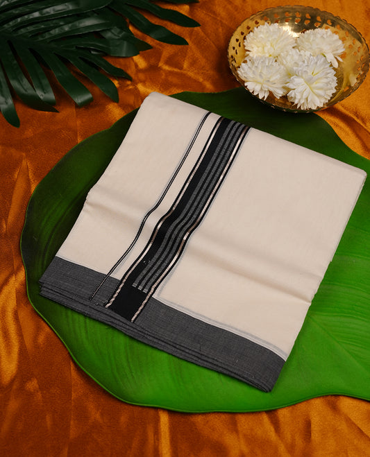 Cream colour cotton double dhoti featuring black colour border with silver zari border