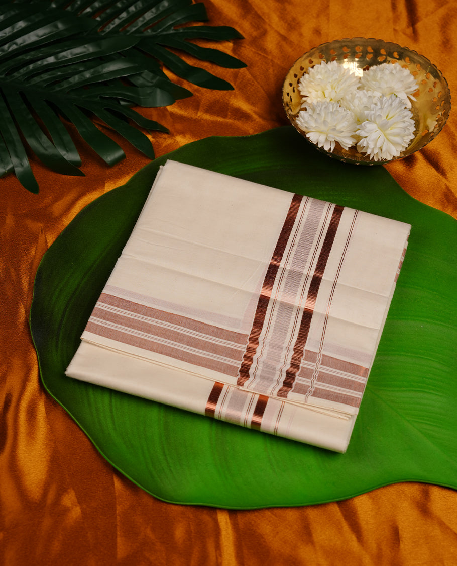 Cream colour cotton double dhoti featuring copper zari border