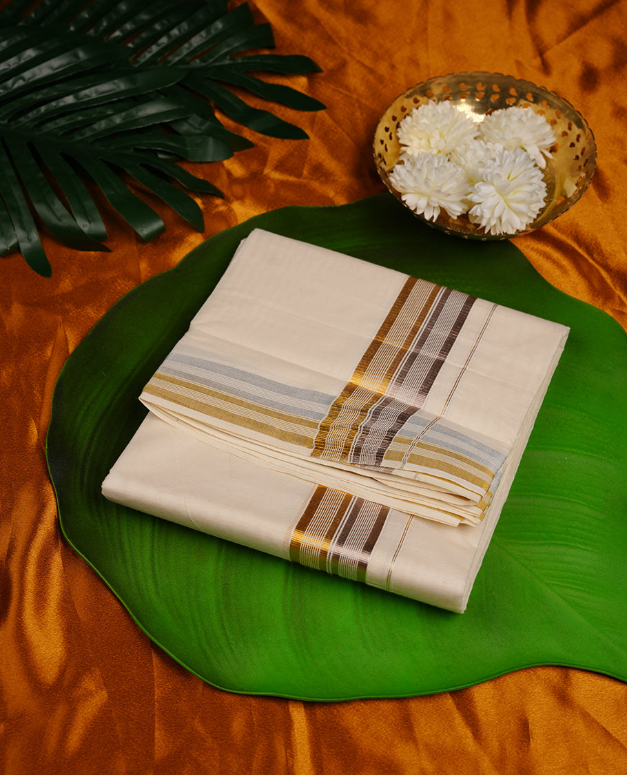 Cream colour cotton double dhoti featuring gold and silver border