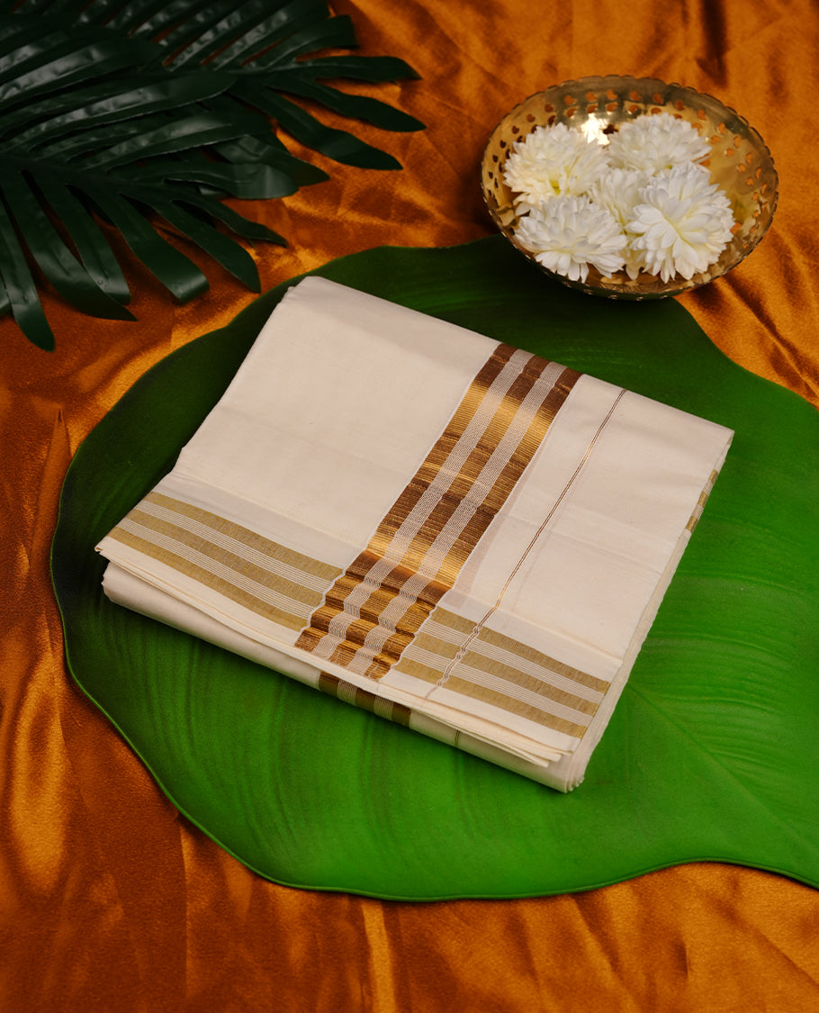 Cream colour cotton double dhoti featuring gold stripes zari border