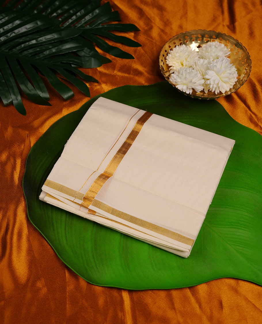 Cream colour cotton double dhoti featuring 1 inch gold kasavu zari border