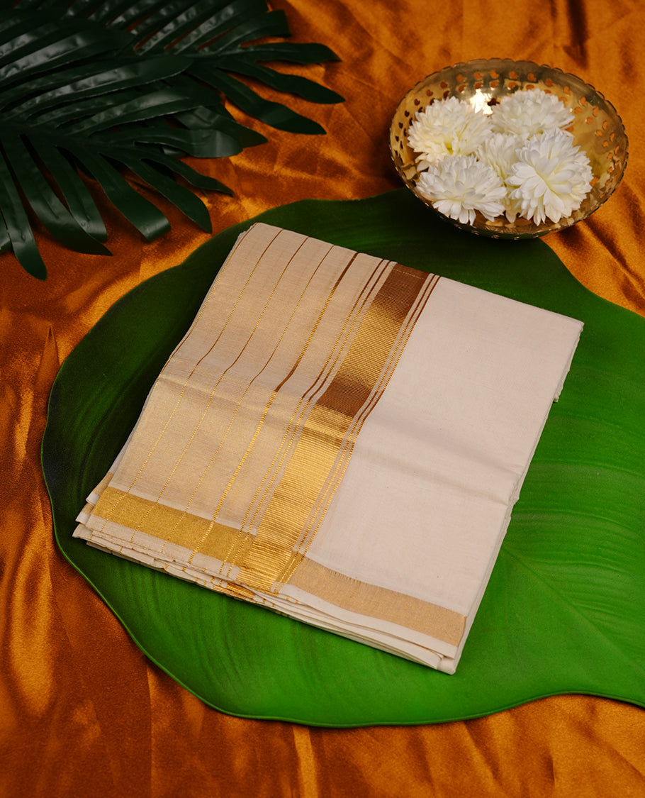Cream colour cotton double dhoti featuring gold kasavu zari border.