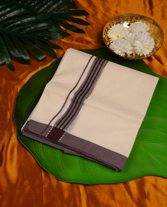 Cream colour cotton double dhoti featuring brown colour border with silver zari border