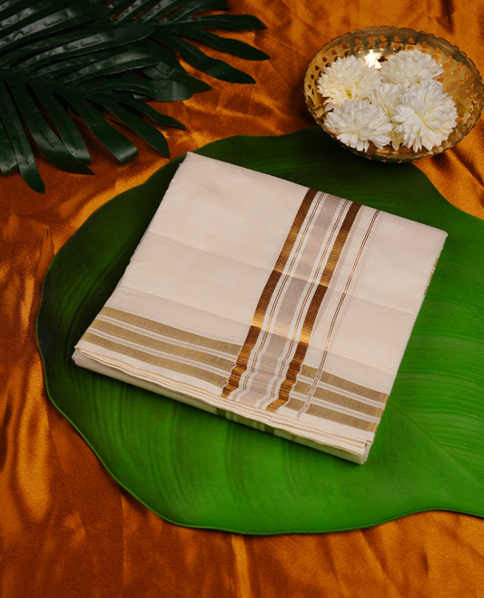 Cream colour cotton double dhoti featuring gold stripes kasavu zari border