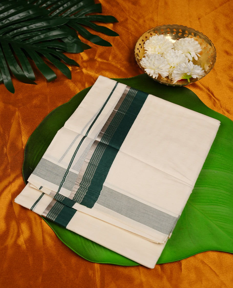 Cream colour RAMRAJ cotton double dhoti featuring green colour border with light gold zari border
