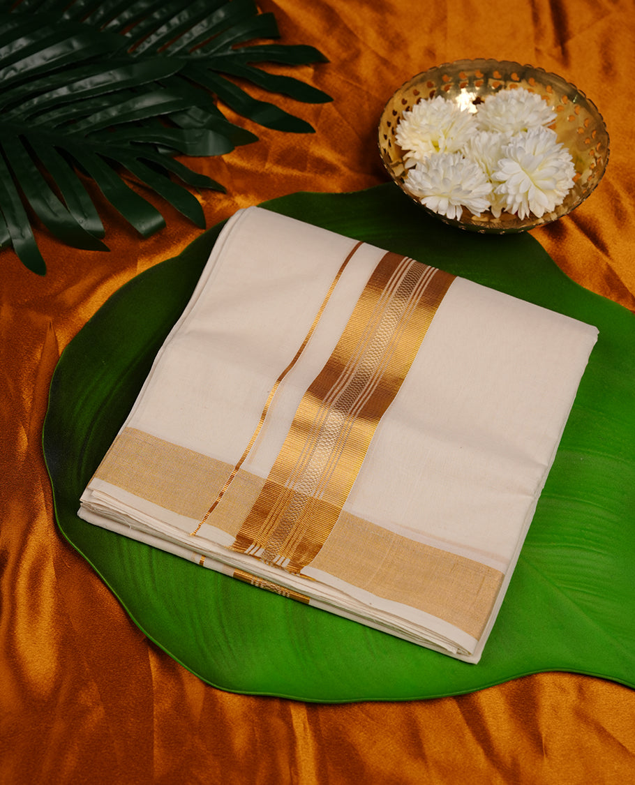 Cream colour cotton double dhoti featuring 3 inch gold kasavu zari border