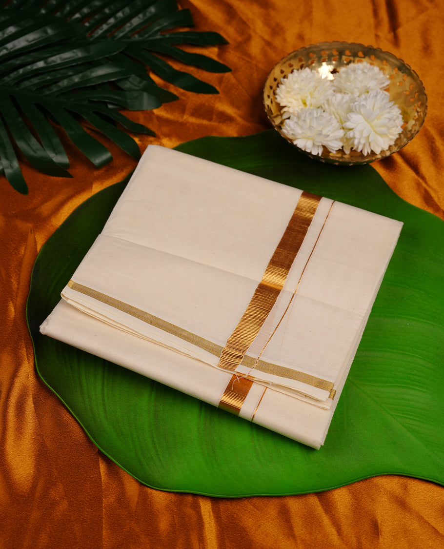 Cream colour cotton double dhoti featuring 2 inch gold kasavu zari border