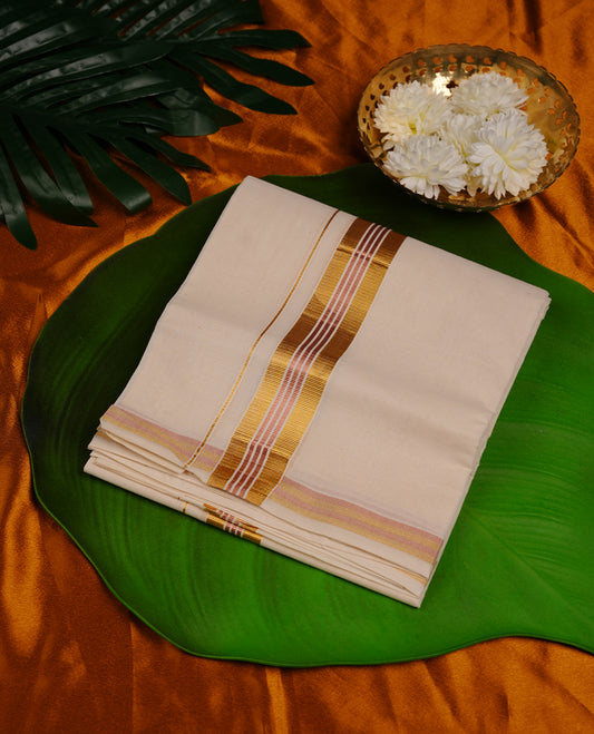 Cream colour cotton double dhoti featuring pink colour border with gold zari border