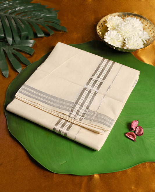 Traditional off white colour pure cotton dhoti featuring a refined silver zari border, exuding elegance and simplicity, perfect for weddings, festive rituals, and cultural occasions.