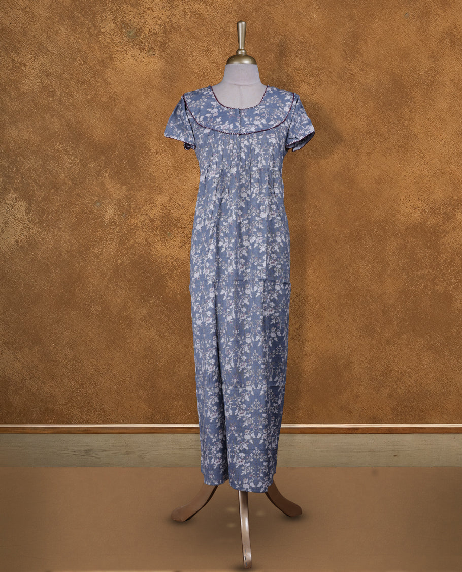 blue gray colour NStyle nighty featuring white floral patterns, a round neckline with maroon piping detailing, short sleeves, and a full ankle-length design.