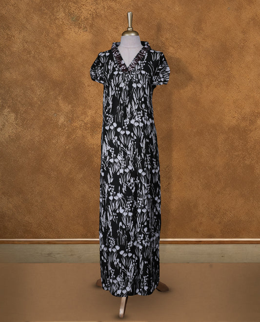 Dark green colour NStyle nighty featuring White floral patterns, a V neckline with thread pattern, short sleeves, and a full ankle-length design.