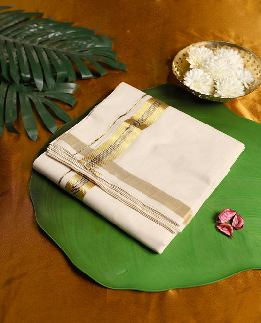 Off white colour pure handloom cotton double dhoti featuring an elegant golden zari border with fine black stripe detailing, offering a graceful and traditional look ideal for festive and cultural occasions.
