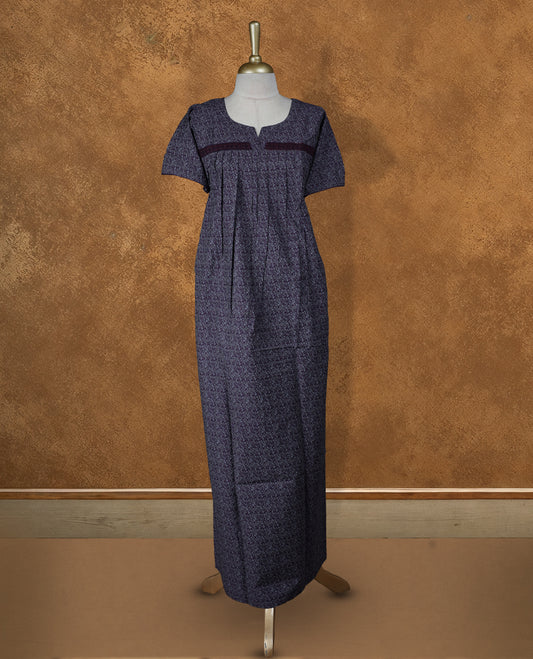 Dark purple colour NStyle nighty featuring gray floral patterns, a round neckline with spilt V, short sleeves, and a full ankle-length design.