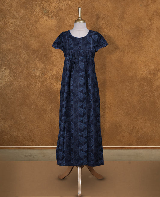 Dark Blue colour Nstyle nighty with featuring a light blue floral pattern, round neckline with light blue lace detailing, Short sleeve, and a full-length