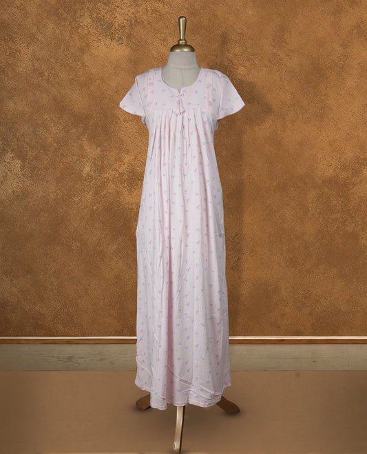 Baby pink colour Nstyle nighty with featuring a floral pattern, a Round neckline with slit cut, Short sleeve, and a full-length