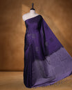 Dark purple colour soft silk saree featuring Antique zari motifs on body with Highlighting contrast Lavender colour pallu and paired with matching blouse piece.