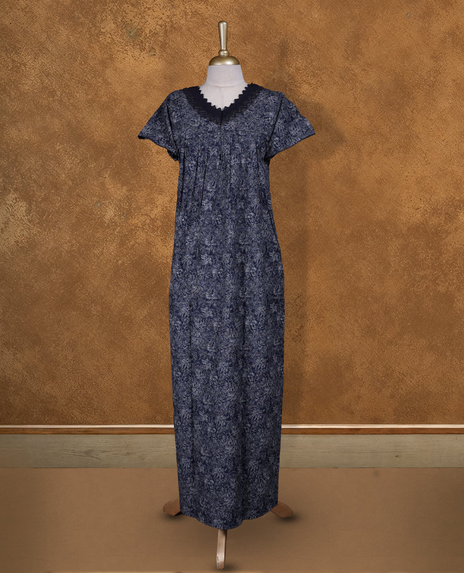 Dark Blue colour Nstyle nighty with featuring a White floaral pattern, a V neckline with lace detailing, Short sleeve, and a full-length
