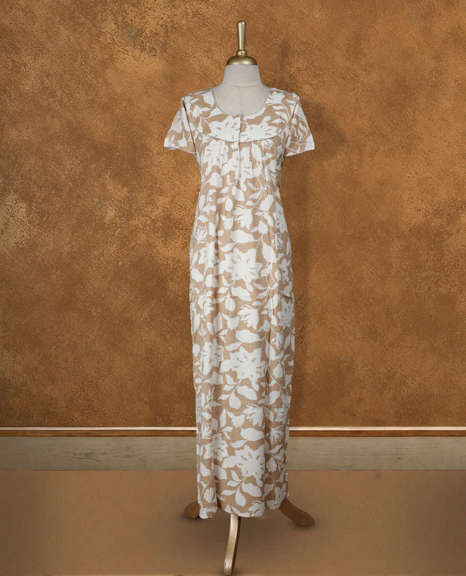 Tanned gold colour NStyle nighty featuring Cream floral patterns, a Round neckline with thread border, short sleeves, and a full ankle-length design.
