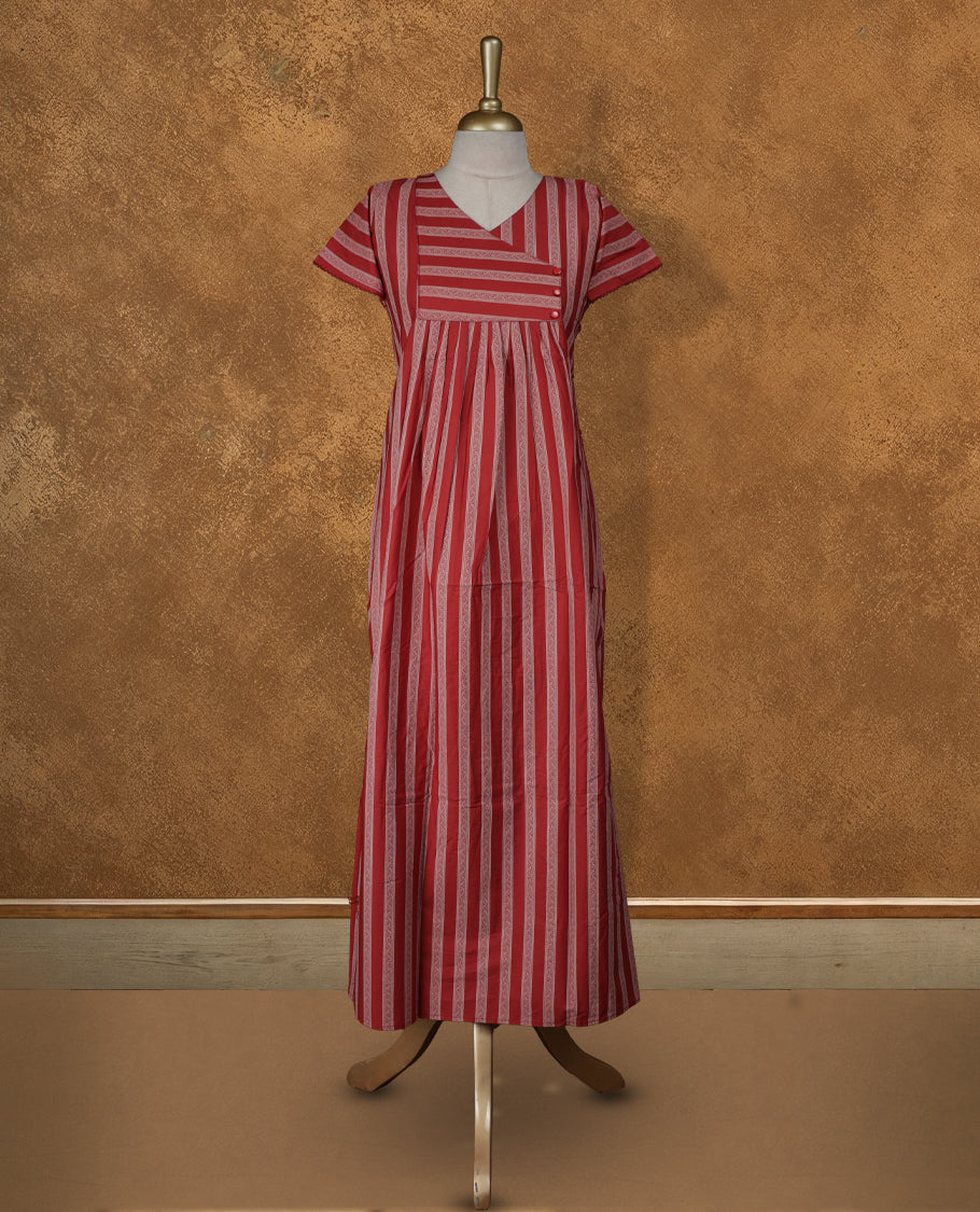 Brick red colour Nstyle nighty with featuring a floral pattern, a V neckline with design pattern, sleeveless, and a full-length