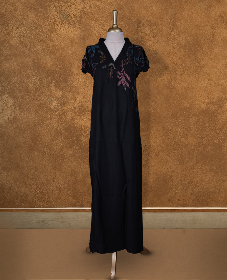 Black colour NStyle nighty featuring coloured floral pattern, a V neckline with collar, short sleeves, and a full ankle-length design.