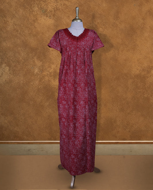 Dark red colour NStyle nighty featuring white floral patterns, a wide V neckline with design lace, short sleeves, and a full ankle-length design.