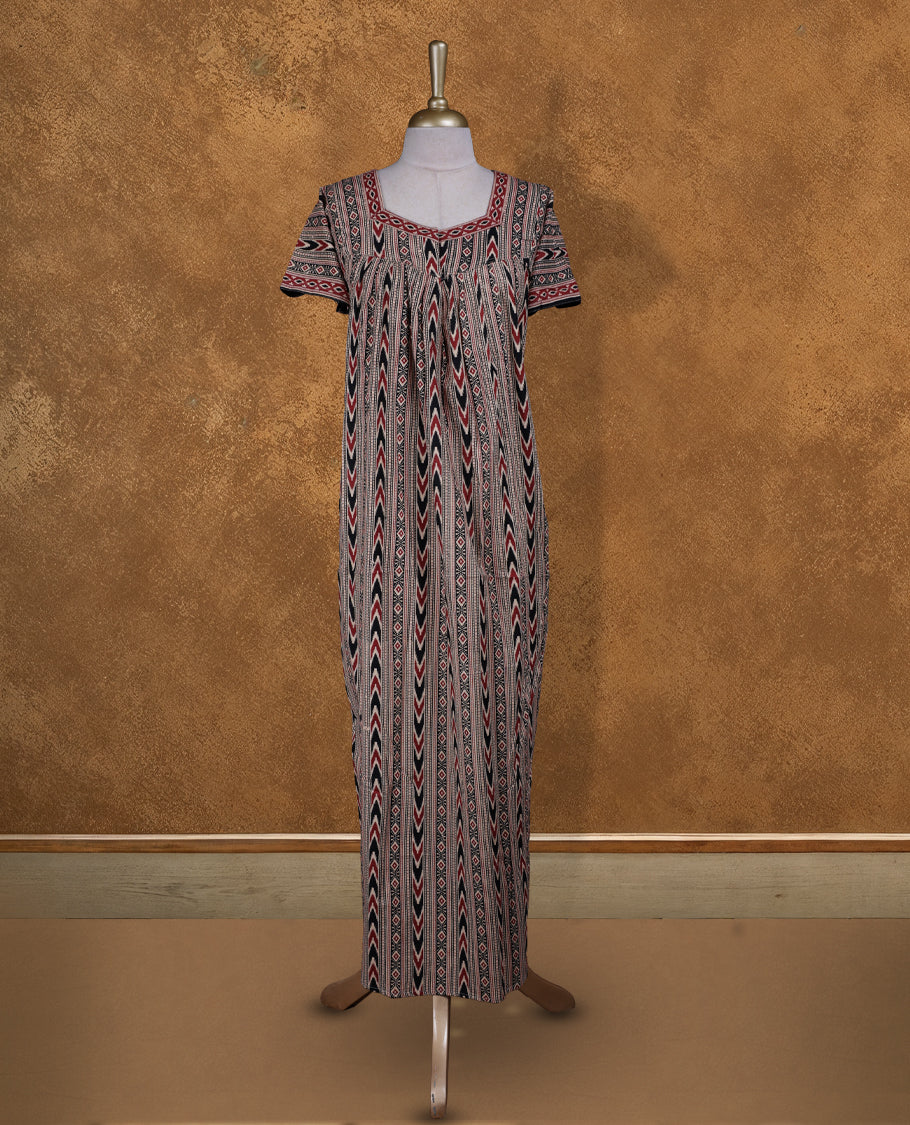 Beige colour NStyle nighty featuring black and red geometric patterns, a Diamond neckline and matching printed border, short sleeves, and a full ankle-length design.