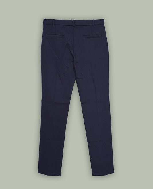 Dark Navy Blue colour pant featuring a clean waistband, pocket detailing and a straight fit.