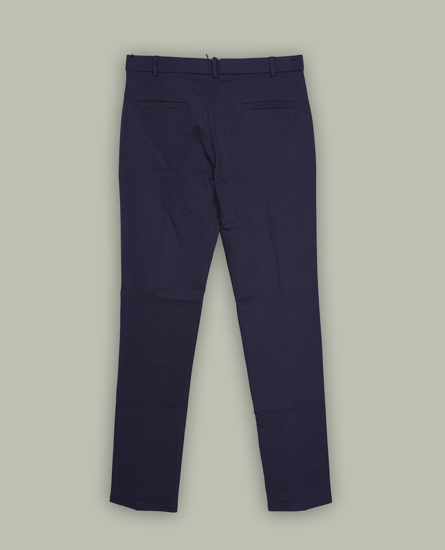 Dark Navy Blue colour pant featuring a clean waistband, pocket detailing and a straight fit.