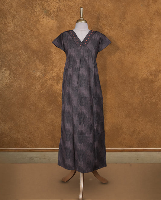 brownish gray colour NStyle nighty featuring black patterns, a V-neckline with thread detailing, short sleeves, and a full ankle-length design.