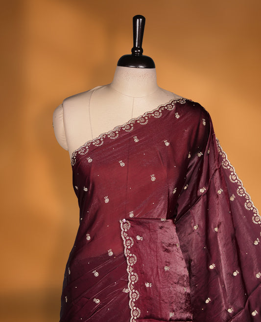Dark Brown Colour Chiffon Designer Saree featuring Delicate White Stone Work All Over the Body, with Stone Detailing on the Border and Pallu, paired with a Matching Blouse.