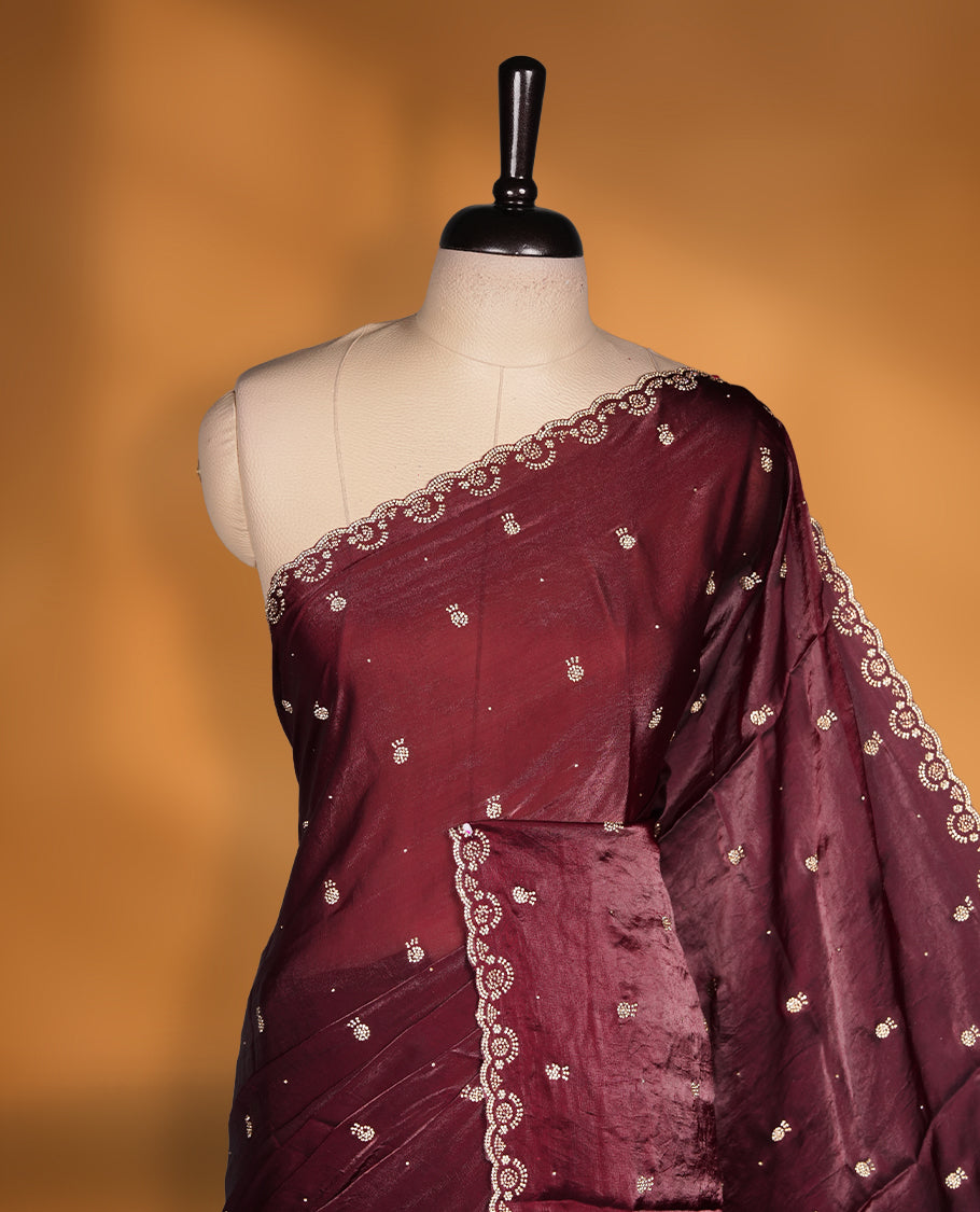 Dark Brown Colour Chiffon Designer Saree featuring Delicate White Stone Work All Over the Body, with Stone Detailing on the Border and Pallu, paired with a Matching Blouse.