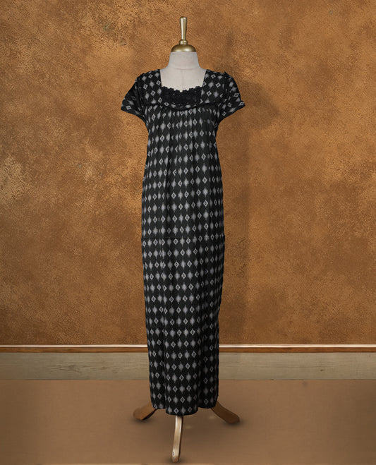 Black colour NStyle nighty featuring white diamond patterns, a Diamond neckline and lace border, short sleeves, and a full ankle-length design.