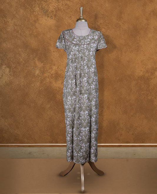 Olive Green colour NStyle nighty featuring white floral patterns, a round neckline with maroon piping detailing, short sleeves, and a full ankle-length design.