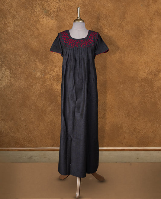 Black colour NStyle nighty featuring white geometric pattern, red colour floral patterns on a U neckline with red colour pipe details , short sleeves, and a full ankle-length design.